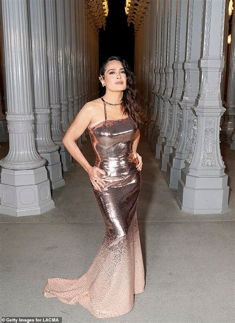 salma hayek dress to gucci fashion show|Salma Hayek Wows in Little Black Dress at Gucci Cruise 2025 .